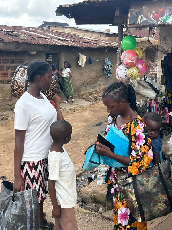 Street market hustle in Jos, Nigeria on a cloudy afternoon