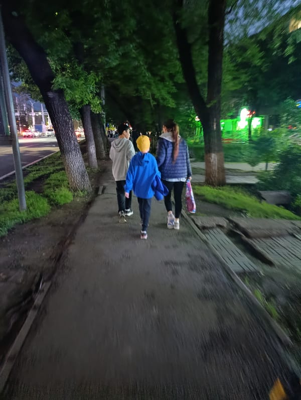 Evening pedestrian activity observed across Almaty sidewalks and pathways