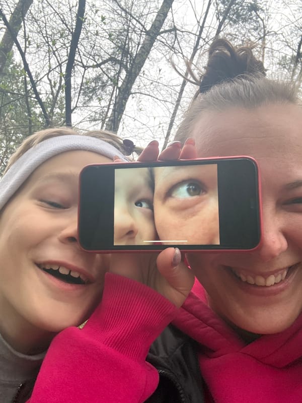 Adult and child enjoy spring forest outing in Dmitrov