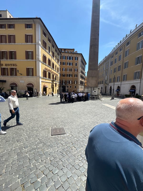 Tourist captures Obelisco Agonale in Rome square