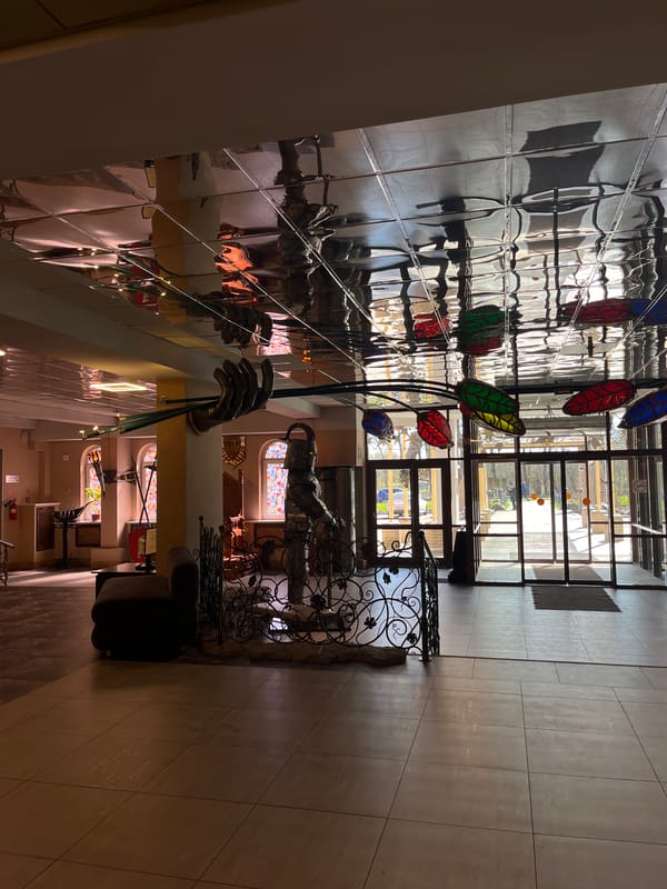 Building interior with reflective tiles documented by witness
