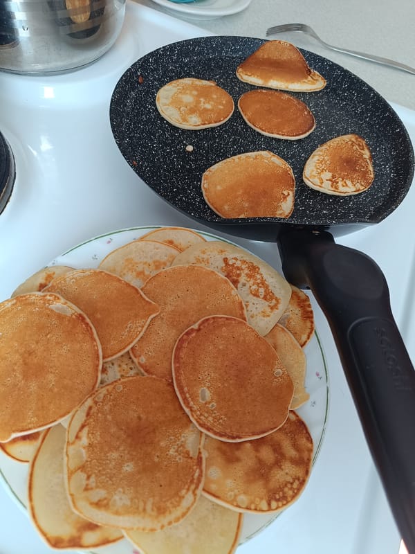 Morning pancake breakfast captured in Tobolsk kitchen scenes