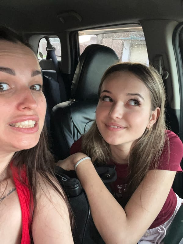 Car selfie session, two people, lots of poses