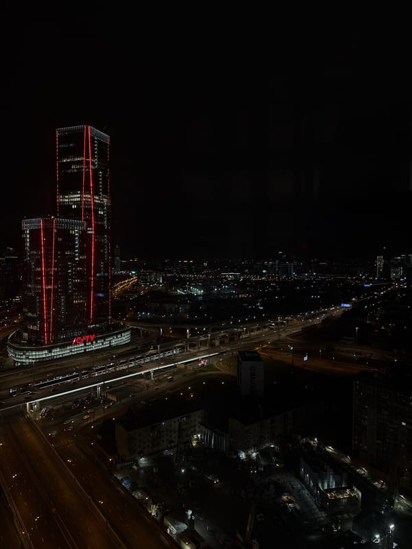 Nighttime aerial footage captures illuminated ICITY complex in Khimki