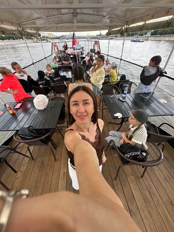 Riverboat cruise past Moscow's Stalinist skyline on a summer afternoon