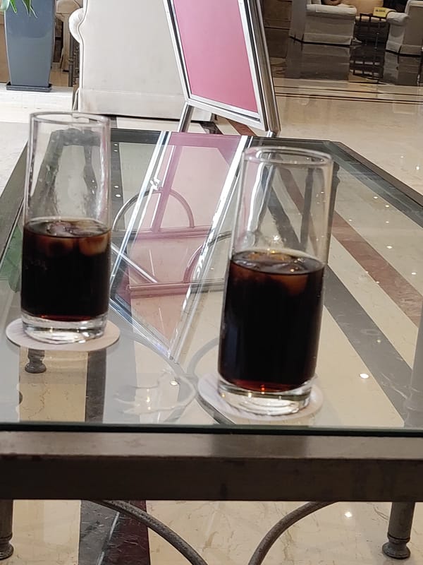 Inside a well-appointed hotel lobby in Rhodes, Greece