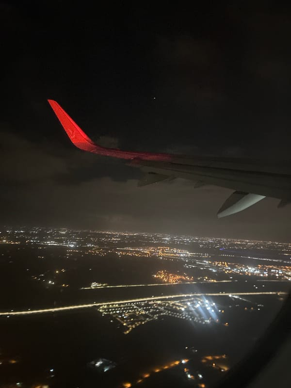 Nighttime aerial view captures city lights over Victoria, Morocco