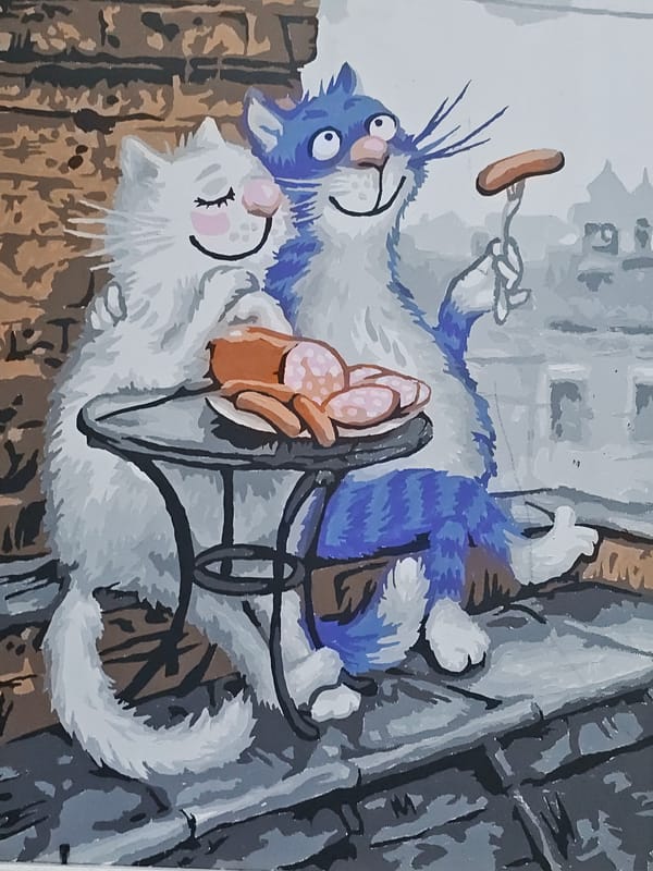 White cat investigates shrimp, hanging out at home