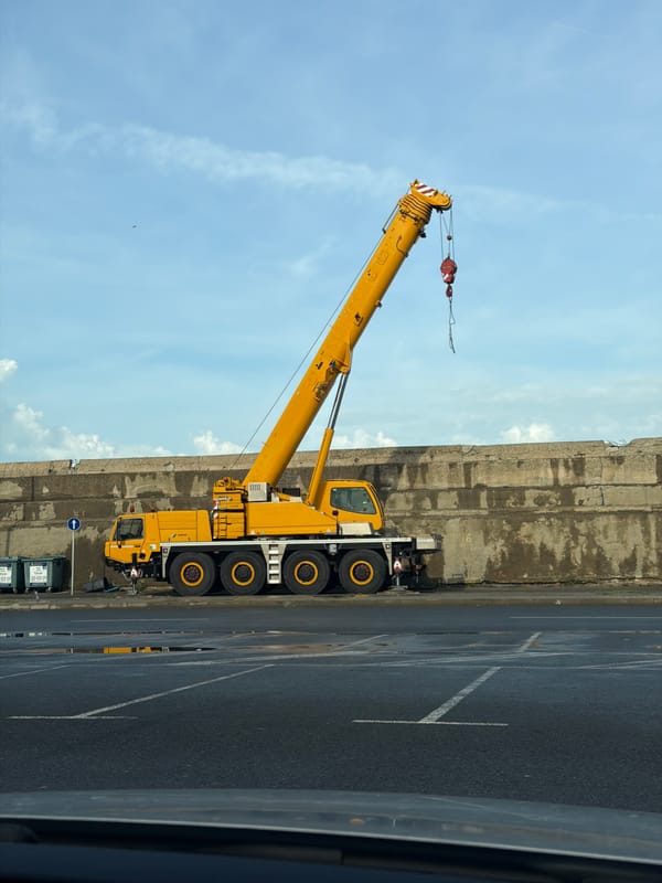 Port operations continue in Burgas with crane work, docked tugboat