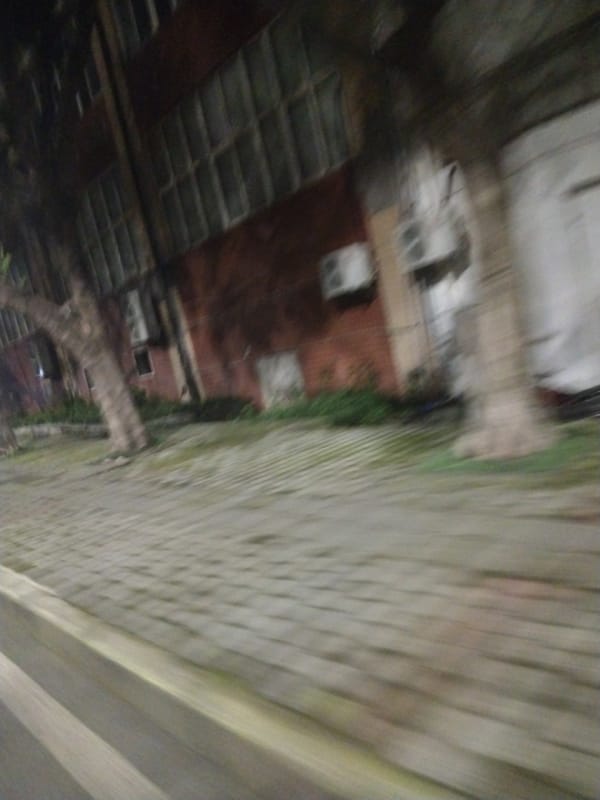 Nighttime street scenes documented in Jiulongpo District, China