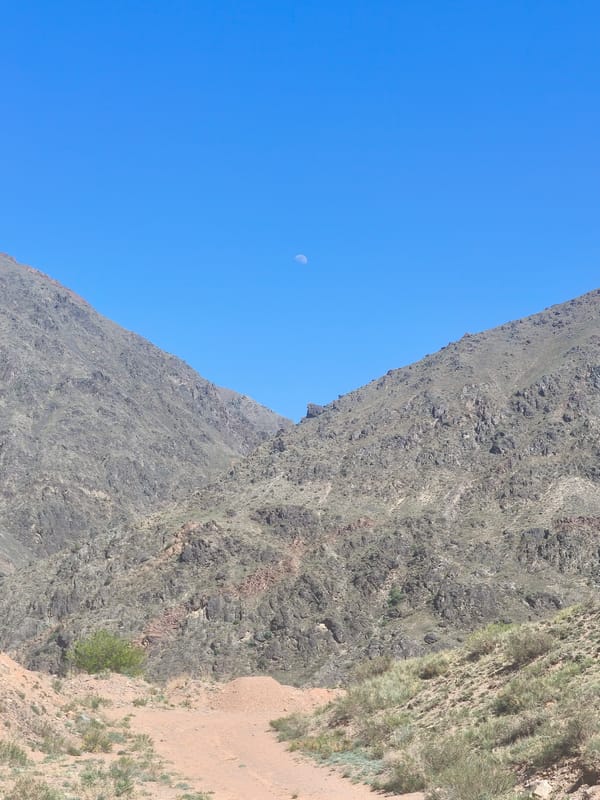 Morning hike documented in Kyrgyzstan mountain valley near Krasnyy Most