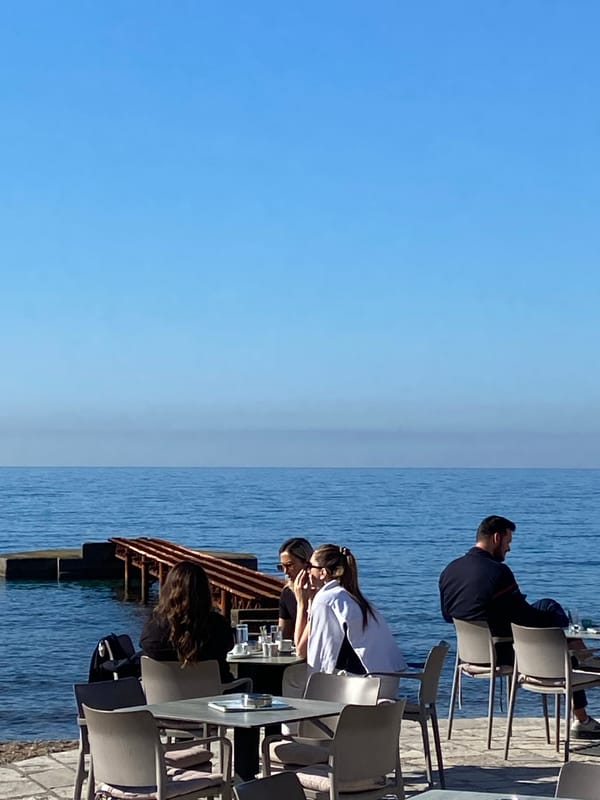 Morning waterfront scenes captured at Budva marina and café