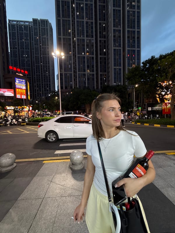 Haizhu District streets come alive at dusk near a metro stop