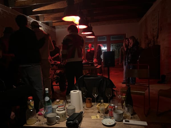 Evening gathering captured in dimly lit Spanish residence