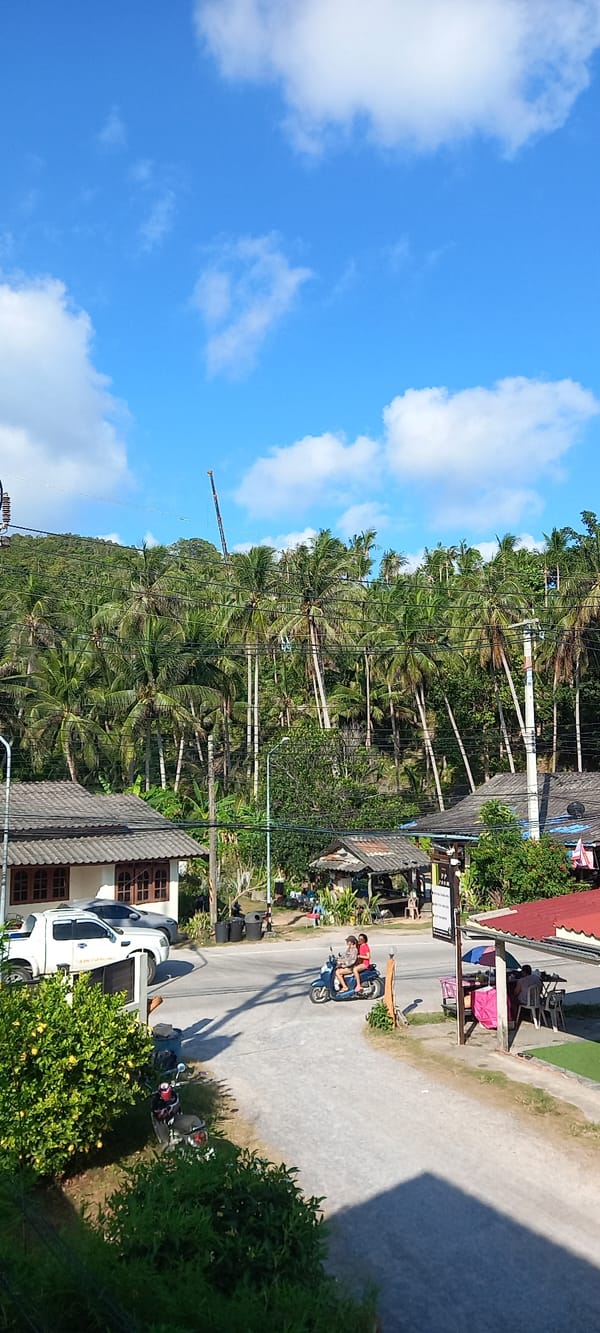 Sunny street scene captured in Baan Chaloklum, Thailand