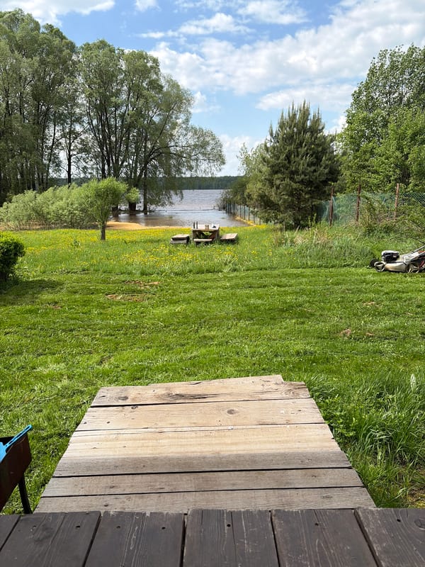 Lakeside property maintenance documented in rural Russia
