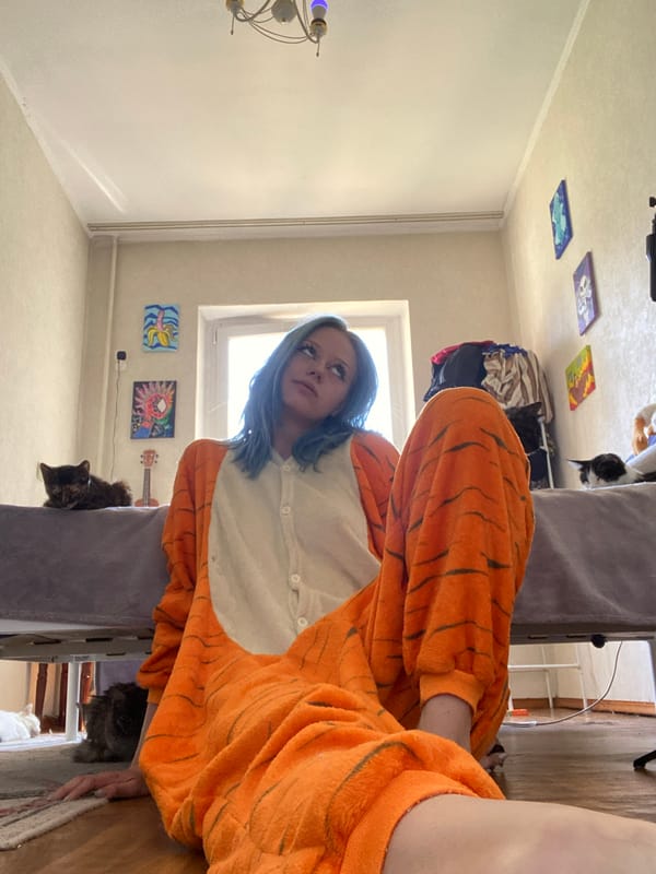 Blue-haired Bishkek morning: bedroom lounging, tree climbing, pets