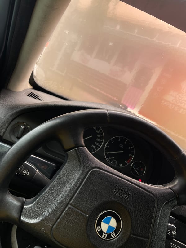 BMW interior documented from driver's seat in Bender, Moldova