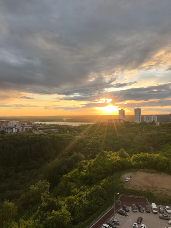 Sunset views captured over Perm, Russia playground and cityscape