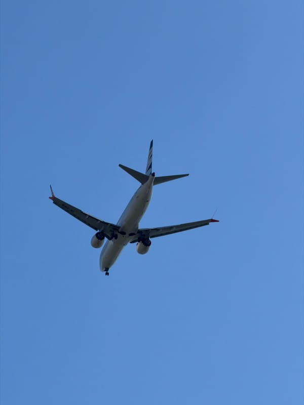 Planes landing at Burgas Airport, plus a BMW iX indoors