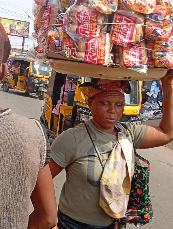 Busy street market activity documented in Onitsha, Nigeria