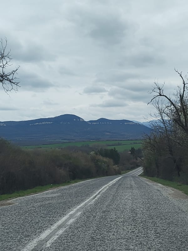 Rural road through mountainous landscape captured in Bulgaria