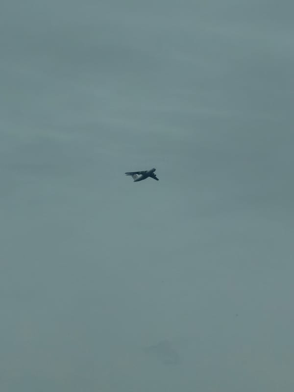 Military jet spotted over Kosoturikha, Russia under overcast skies