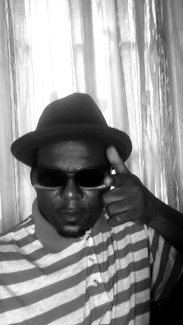 Person poses with sunglasses and scissors in Narayi photoshoot