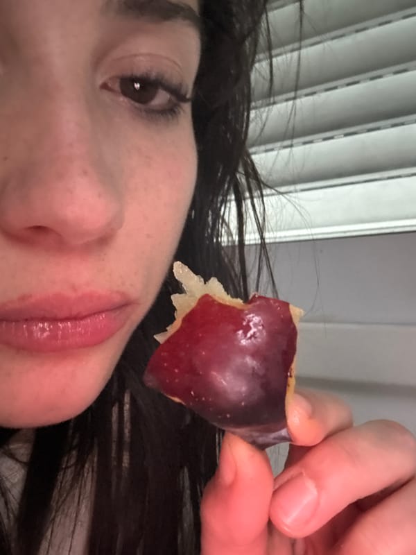Woman resting in bed photographed in Buenos Aires morning