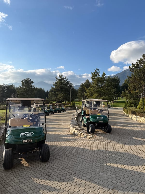 Golf carts parked at Pirin Golf Club, Razlog