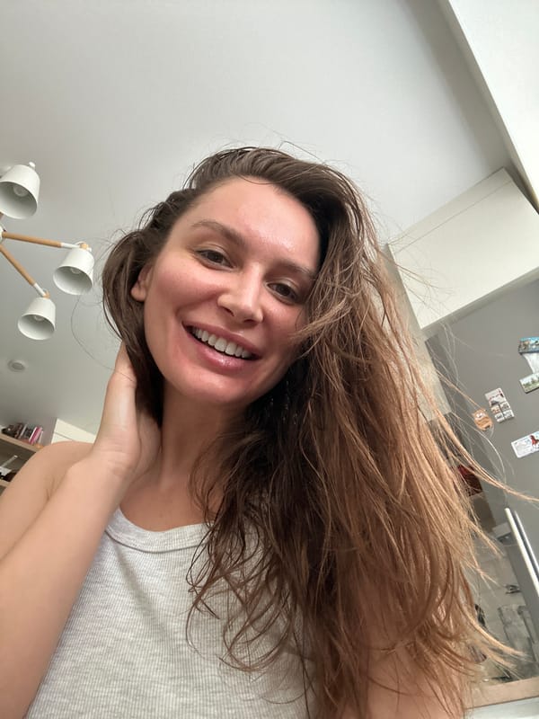 Woman takes indoor selfie in Moscow home setting