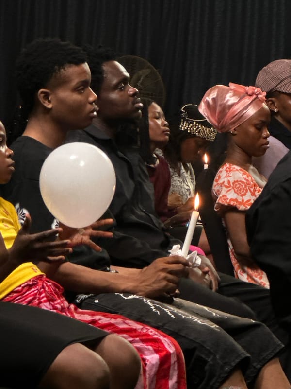 Candlelit memorial vigil held indoors in Ashipa, Nigeria