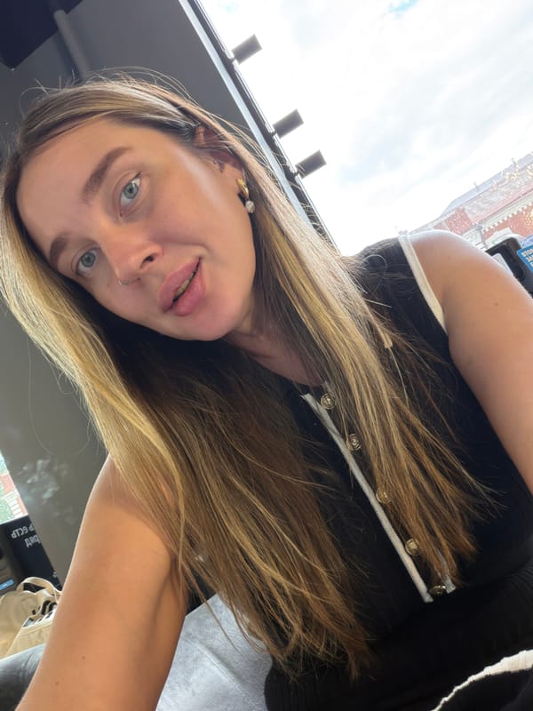 Woman documents Moscow building interior with selfies, chandelier footage