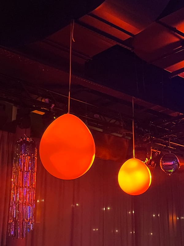 Nightclub scene captured in Montrond-les-Bains with dancing crowds