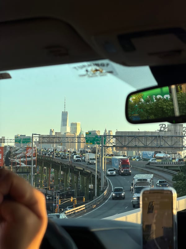 Driver spots One World Trade Center during NYC highway commute