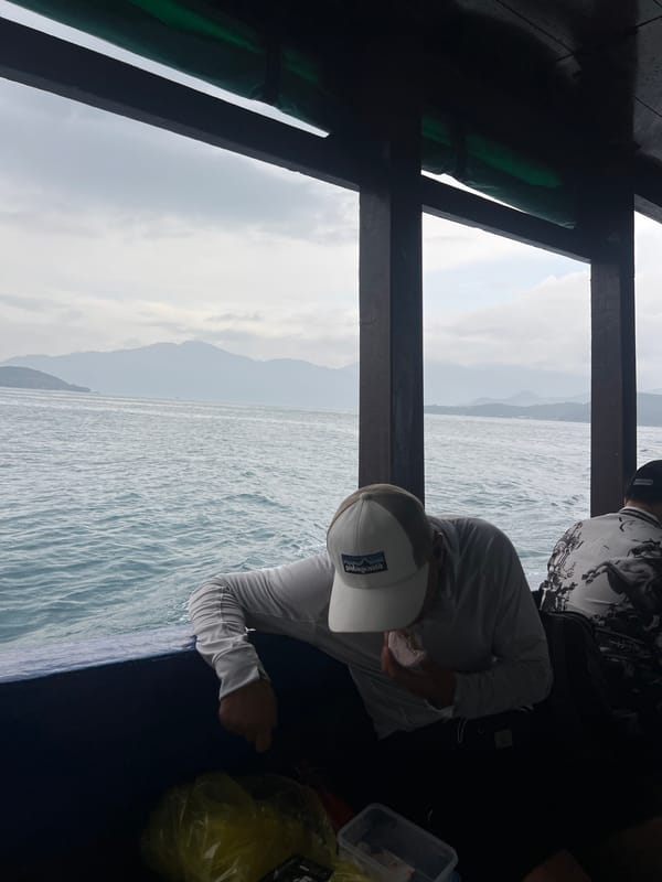 Fishing boat operates in choppy waters off Vietnam coast