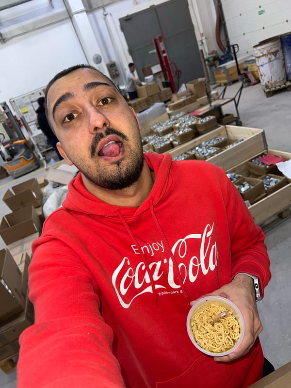 Man in Coca-Cola sweatshirt photographed smiling in Sevlievo, Bulgaria