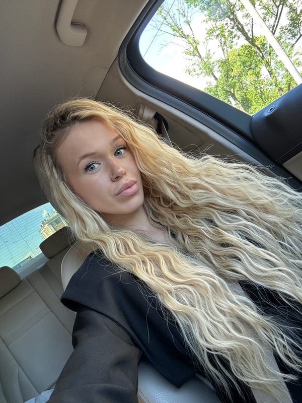 Car selfie session in Saint Petersburg, sunroof open