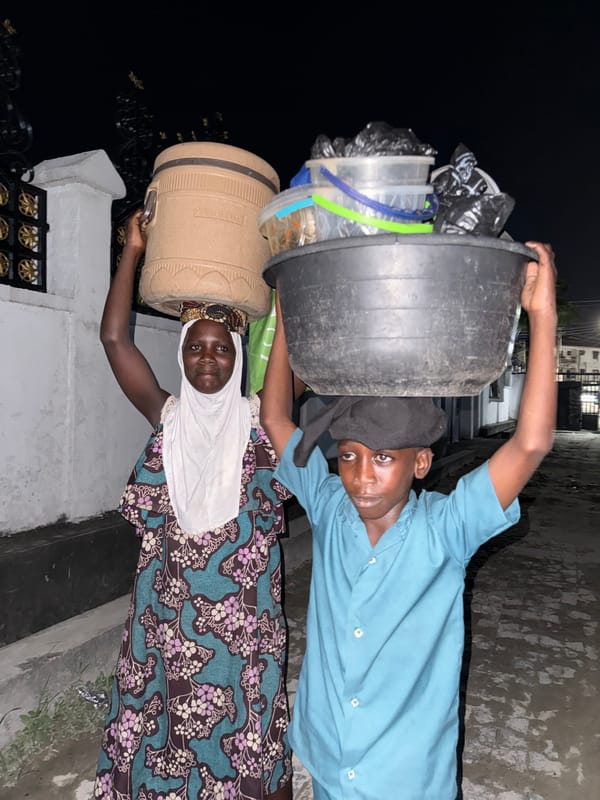 Two people spotted in Ado, Nigeria evening scene