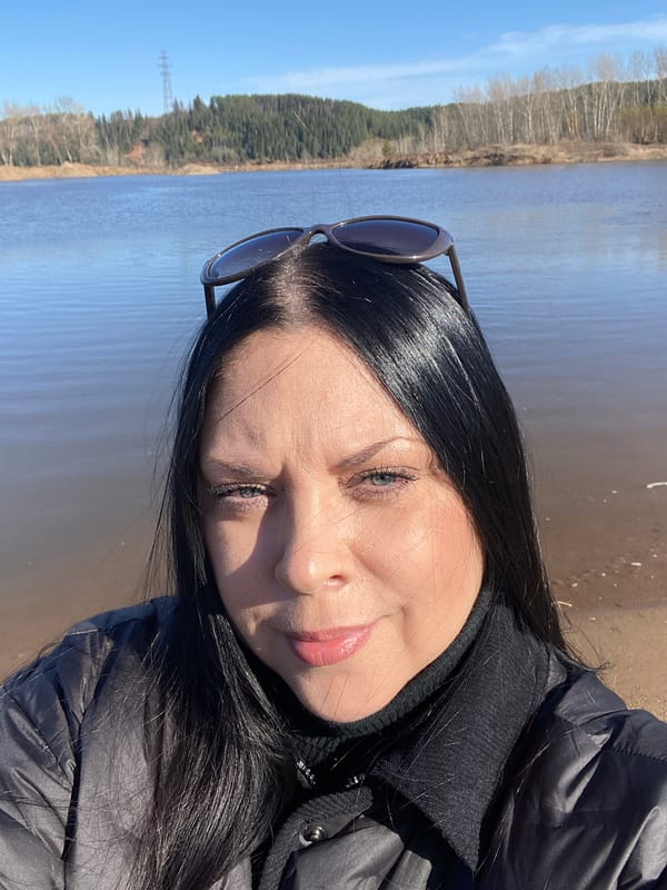 Woman photographed during waterfront outing in Noviy, Russia