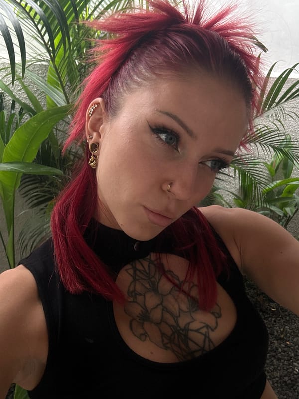 Red-haired individual photographed in casual portrait session, Dalung Indonesia