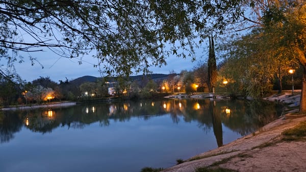 Dusk lakeside scene captured in Stara Zagora, Bulgaria