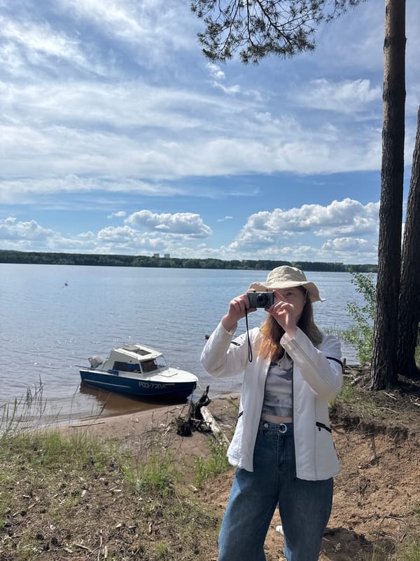 Woman documents nature outing along Kama River near Chaikovsky
