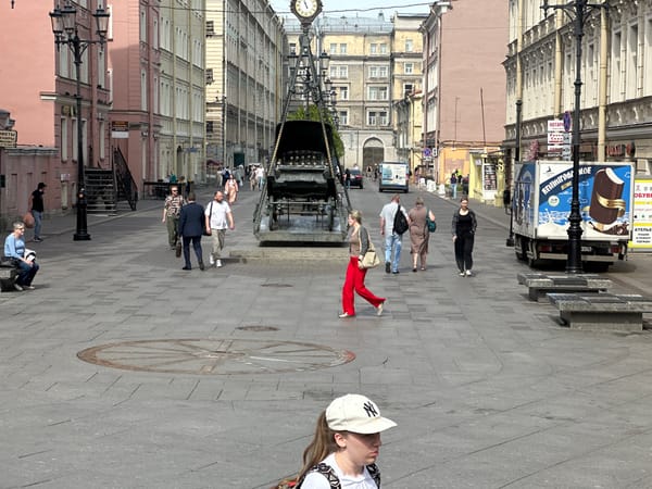 Morning pedestrian activity observed in Saint Petersburg street scene