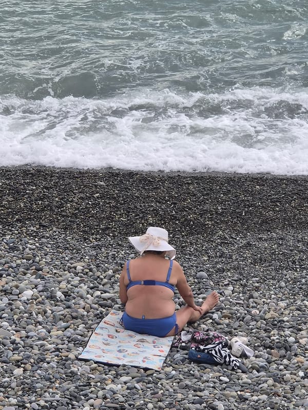 Beachgoers enjoy afternoon activities along Sochi's Black Sea coast