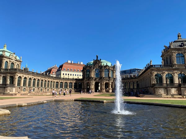 Dresden baroque landmarks documented by visitors on sunny afternoon