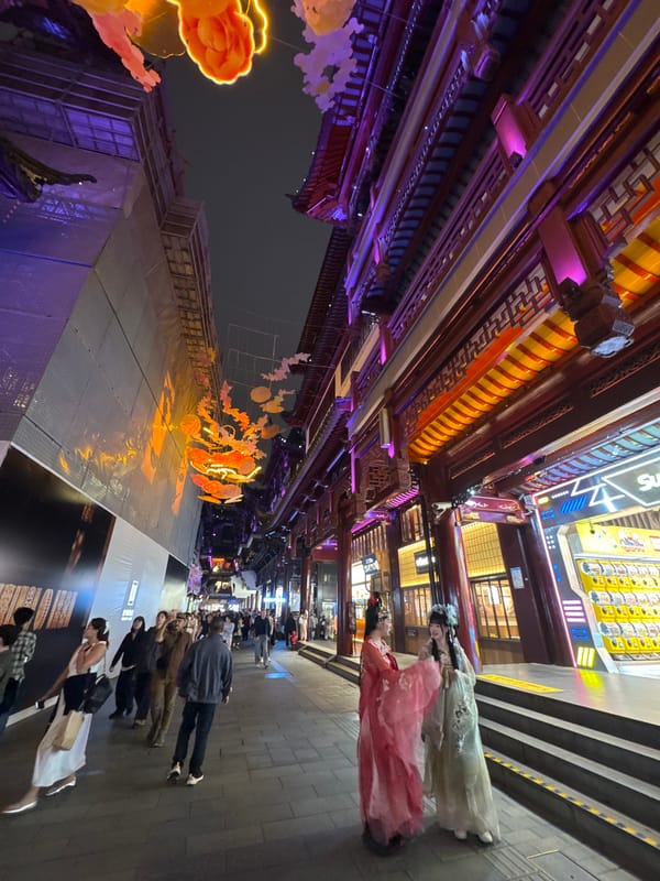 Nighttime crowds gather at illuminated Yu Garden in Shanghai