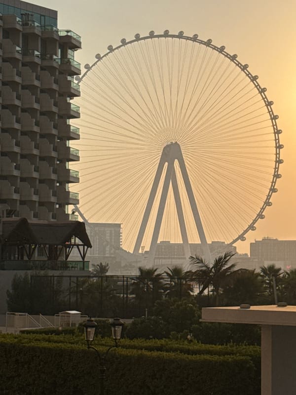 Street level and skyline views across Dubai Marina