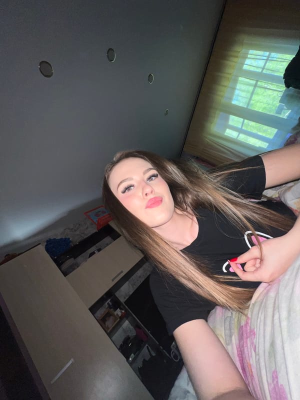 Woman photographed indoors in Noviy, Russia during brief timespan