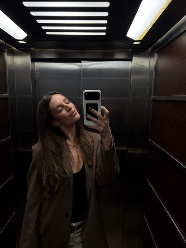 Woman takes elevator selfie in Budva, Montenegro